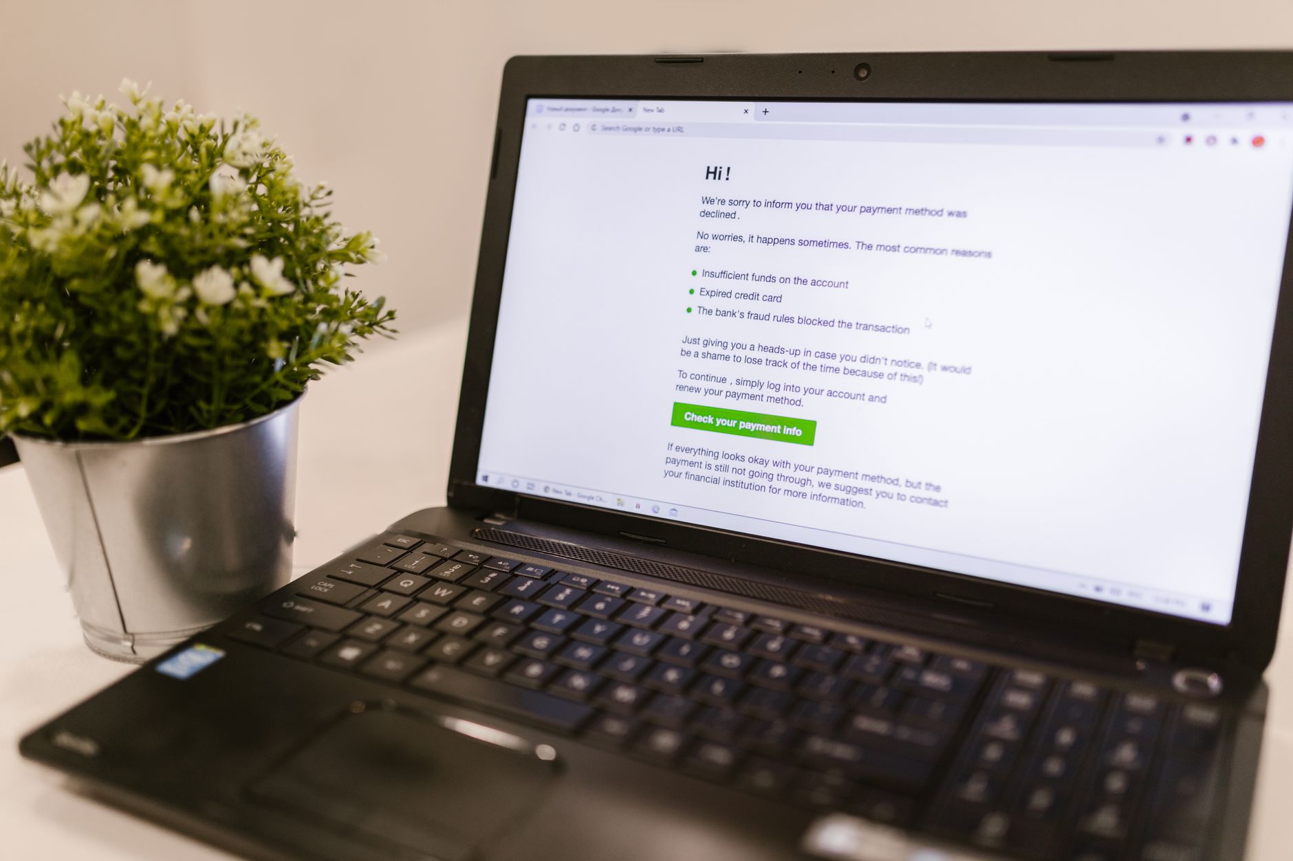 Customer using a laptop to start a business messaging conversation
