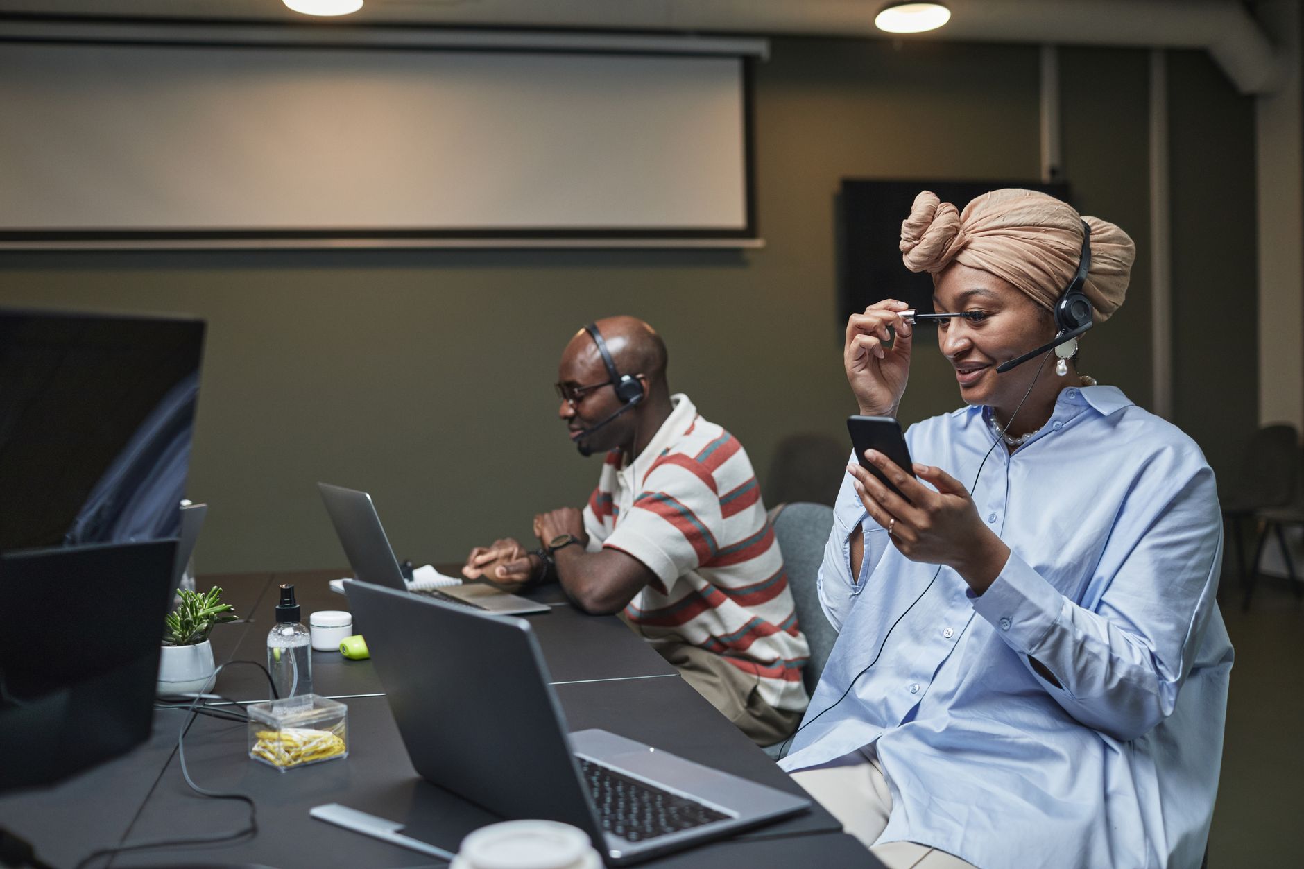 Customer support team managing messaging channels for website leads